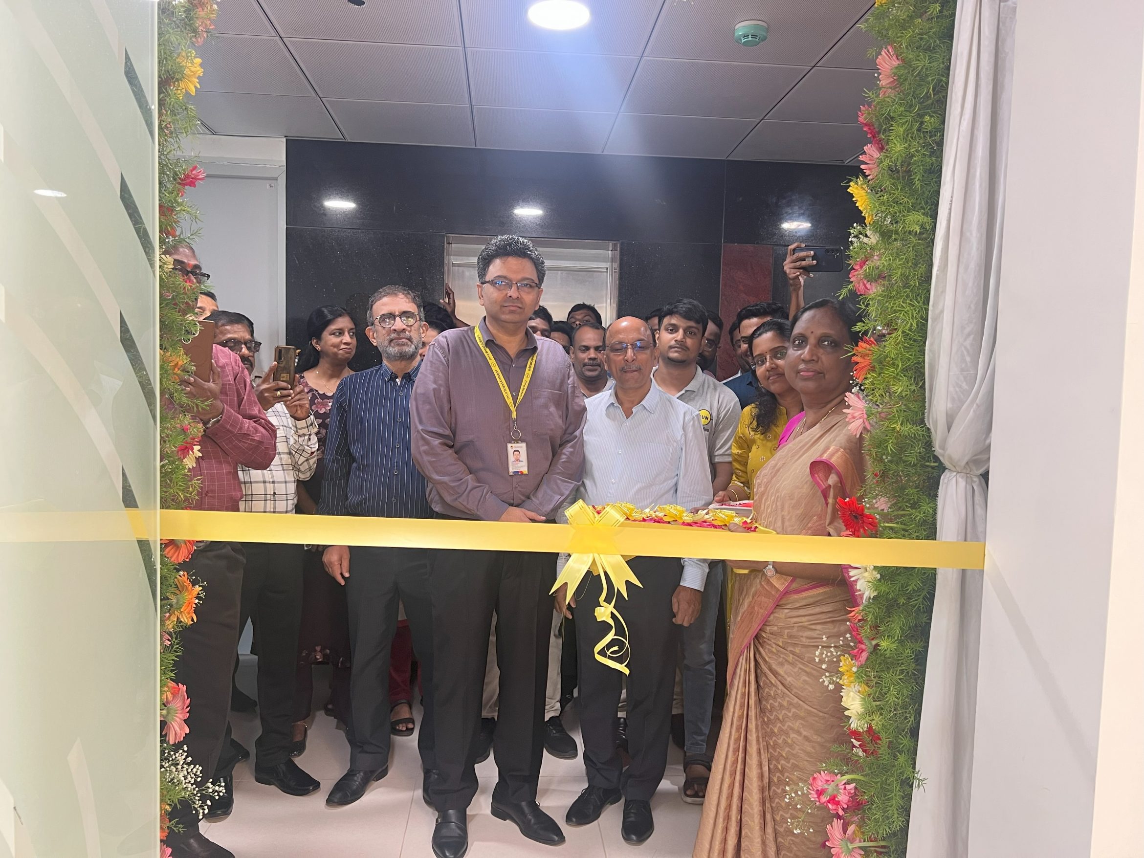 Sun Branding's Chennai team with yellow ribbon